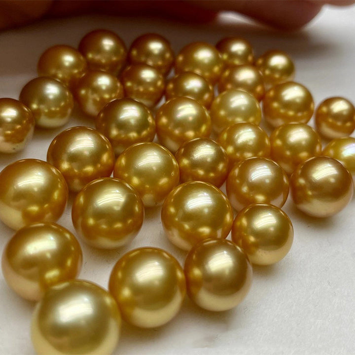 Nearly Round And Slightly Flawed Golden Sea Water Nude Beads