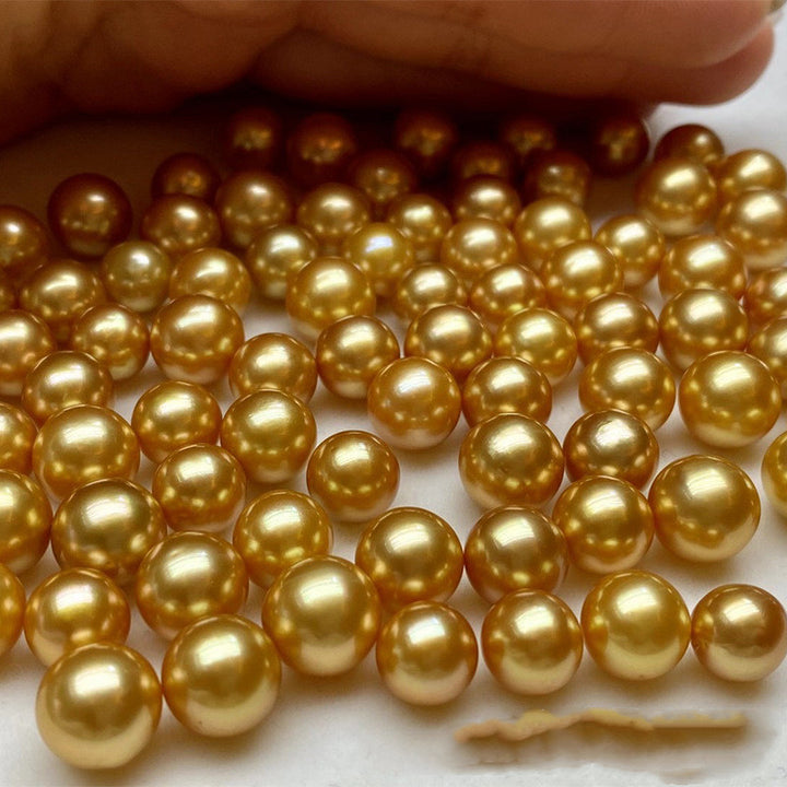 Nearly Round And Slightly Flawed Golden Sea Water Nude Beads
